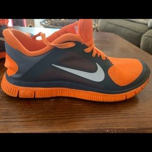 Orange Nike Free shoes